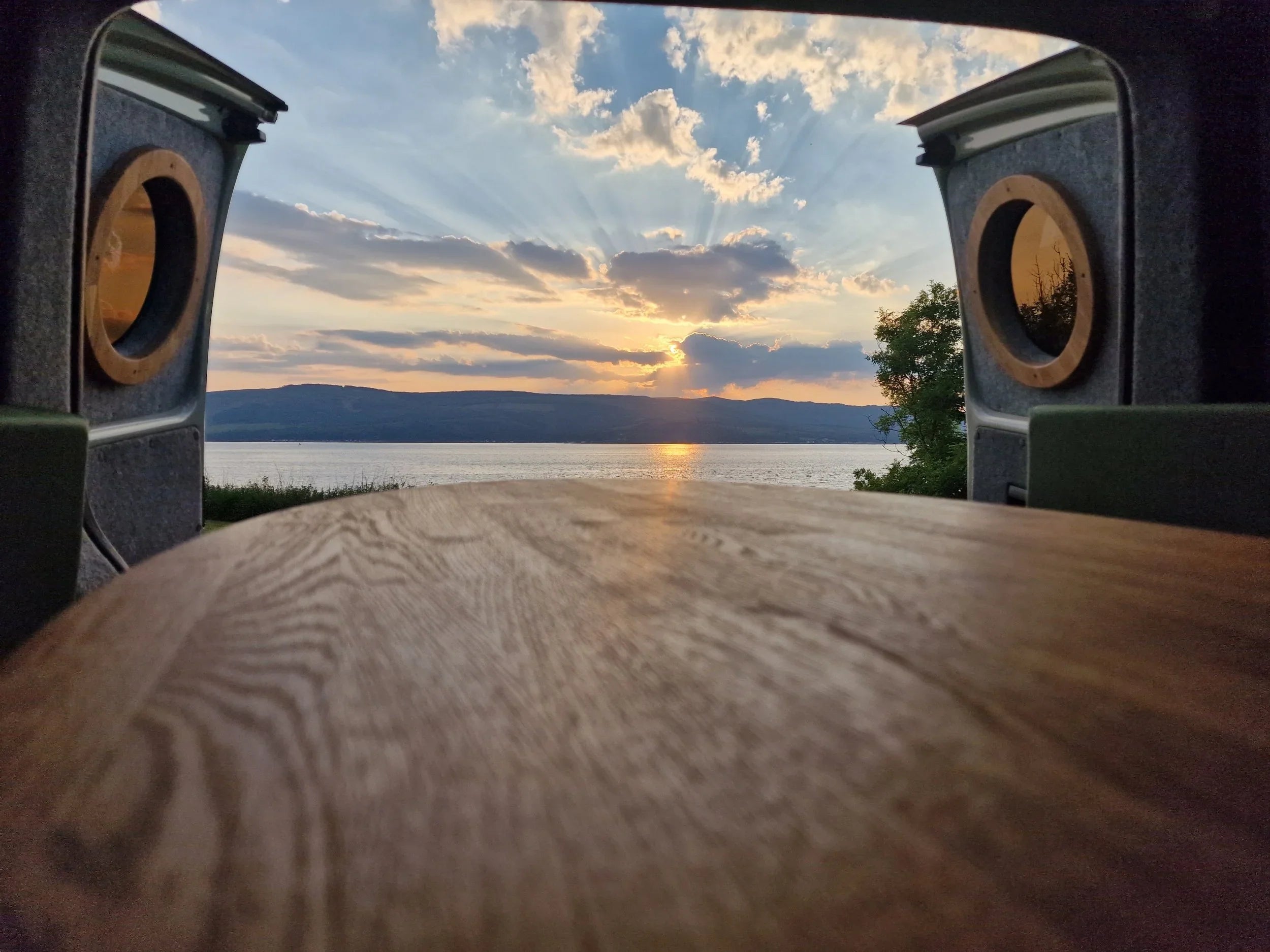 Lucille wooden table with natural grain and warm brown tones