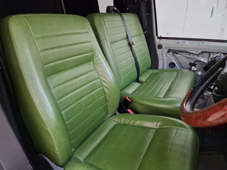 Classic Lucille green leather seats with wooden accents, Scottish outdoor access vibe