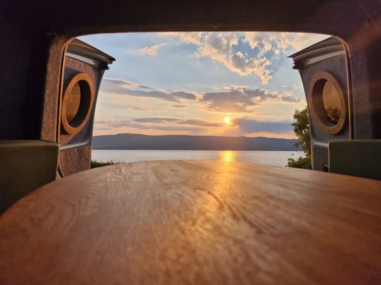 Lucille wooden table with curved edge and natural grain pattern