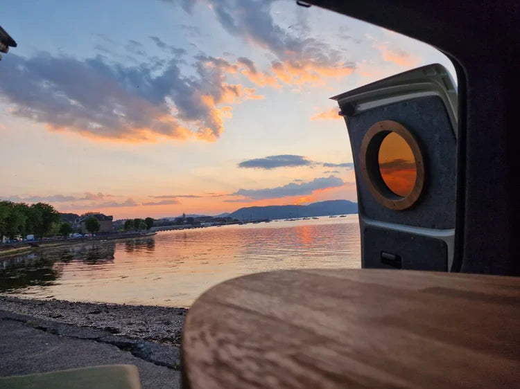 Lucille wooden table with curved edges and natural grain for Scottish outdoor access