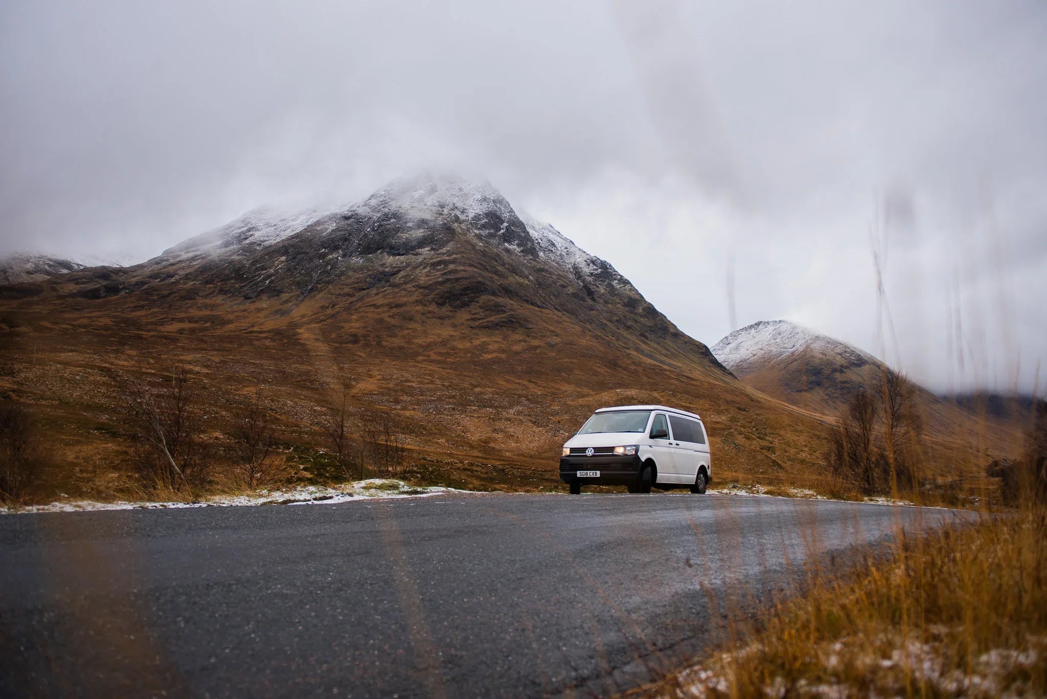White 2019 Volkswagen Transporter T6 van with black roof and silver accents for Mindy, Scottish outdoor access